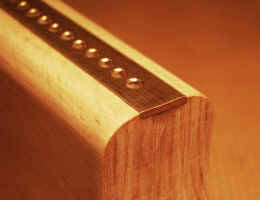 Detail_bois_laiton.JPG (107399 octets)